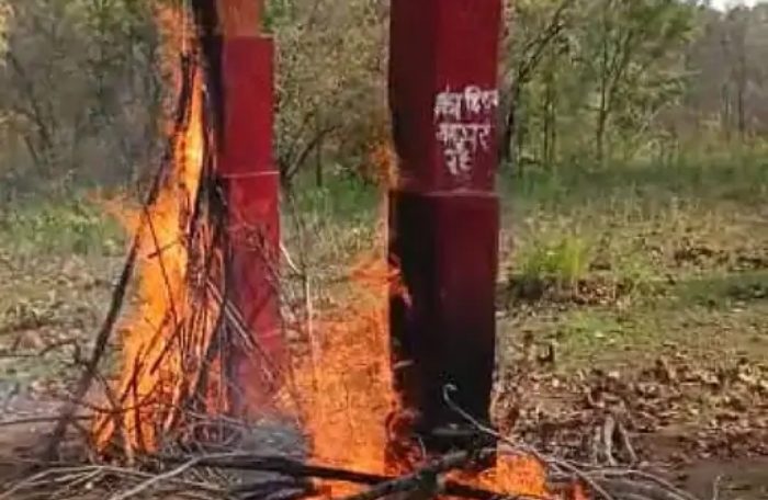 burn naxalites wooden memorial