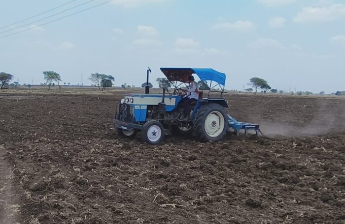 farmers in field for crops